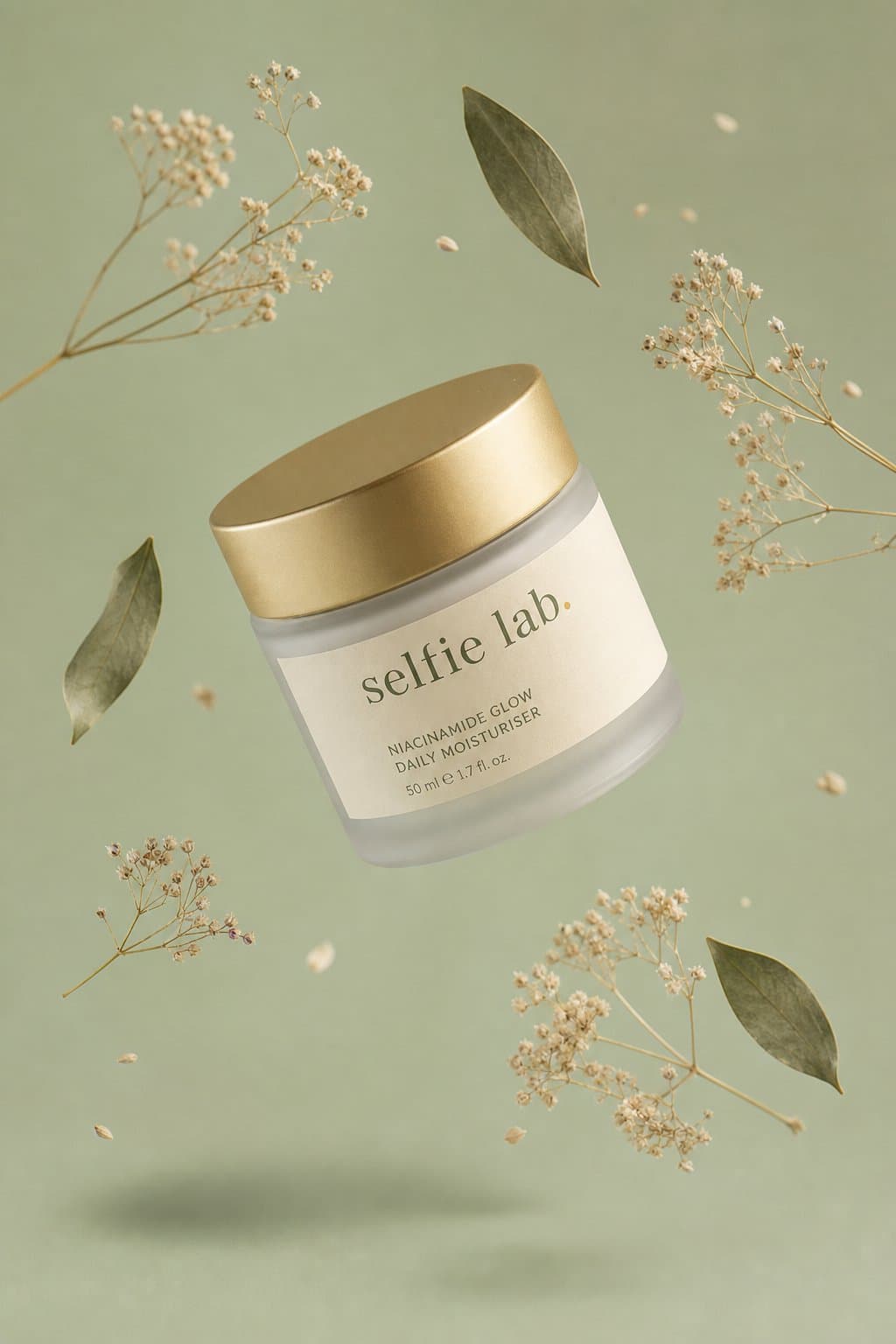 Selfie Lab cream jar floating among botanicals